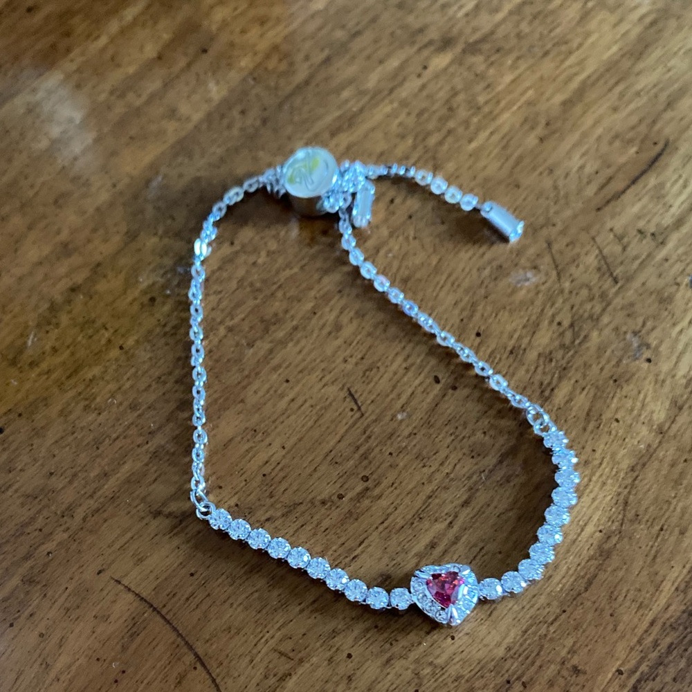 Swarovski crystal bracelet with red heart. Never worn and new with original box!